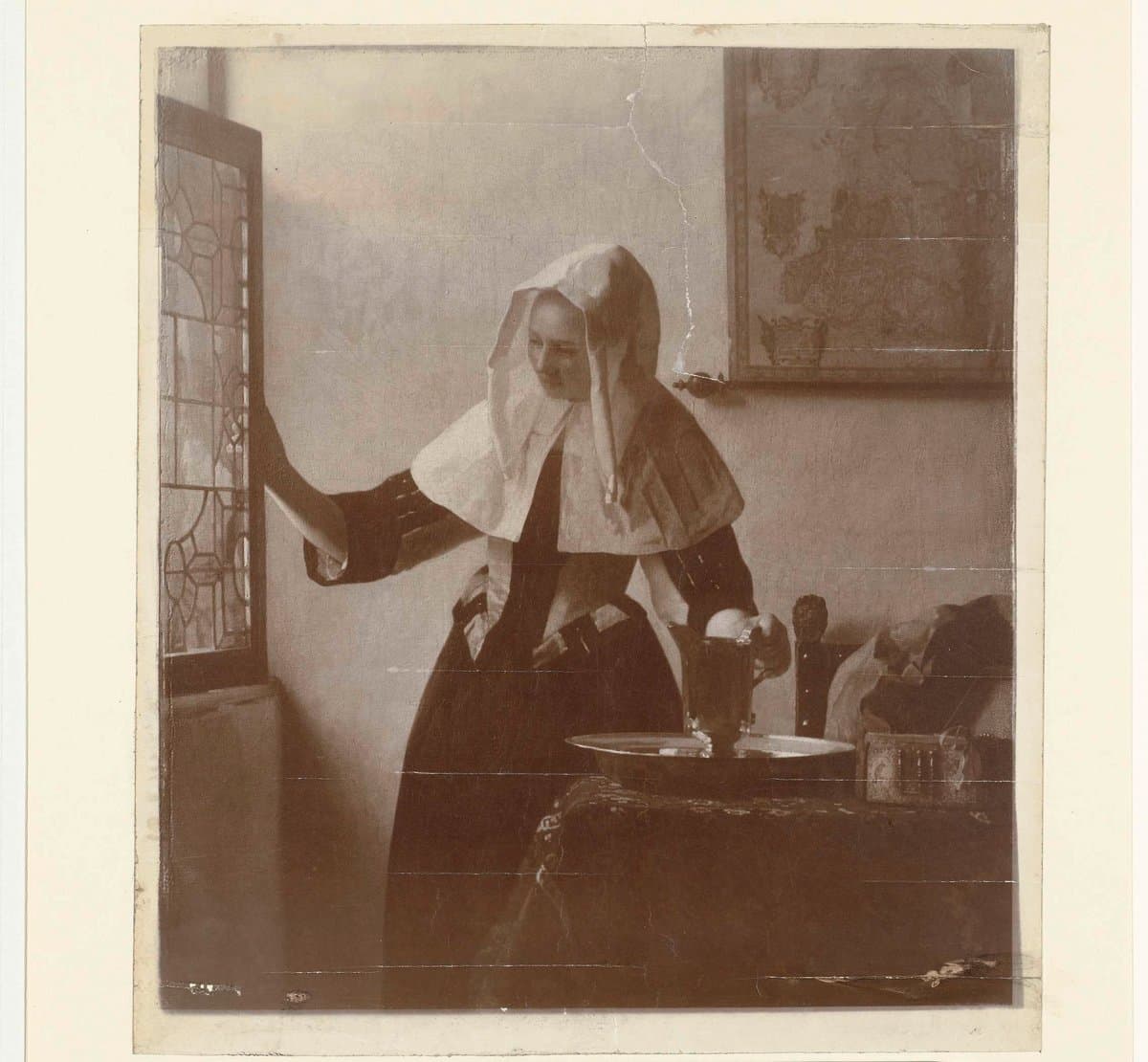 Fotoreproductie Schilderij Vrouw met waterkan door Johannes Vermeer